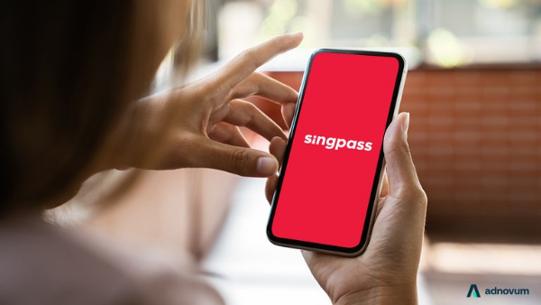 User accessing the Singpass mobile app for secure digital identity verification and online government services in Singapore.